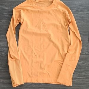 Lululemon monarch orange swiftly size 6